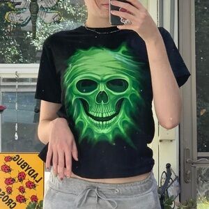 Black shrunken tee with vibrant neon green skull on front